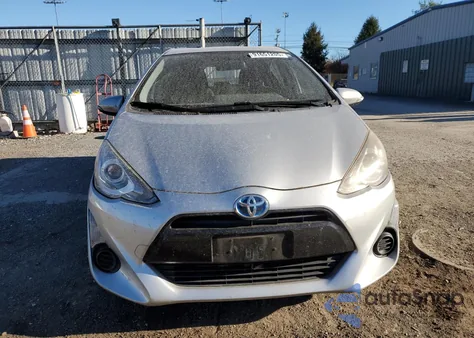 2015 Toyota Prius C from USA, damaged, VIN JTDKDTB33F1585990